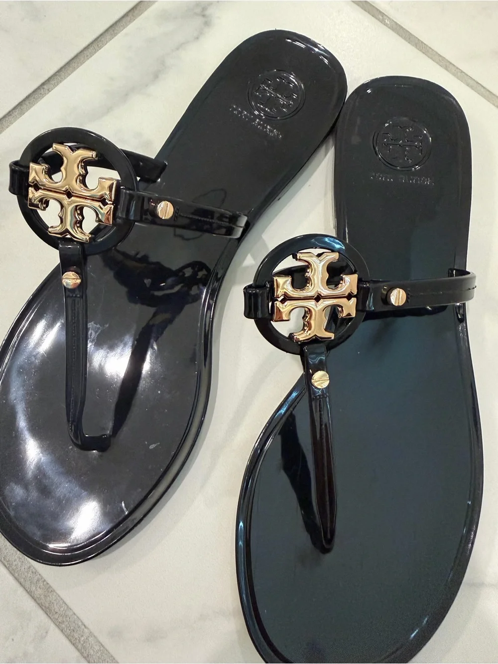 Tory Burch Black Jelly Logo Thong Sandals with Gold Emblem